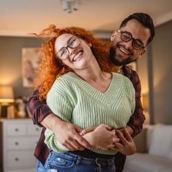 happy couple in renovated home