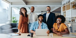 A group of coworkers smiling