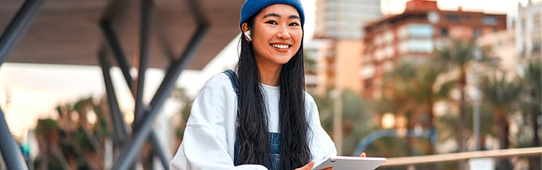 Asian woman blogger outdoors