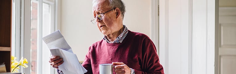 Elderly man struggling With Bills