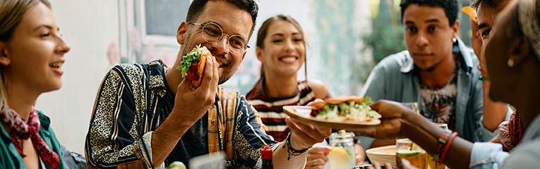 Group of friends eating tacos