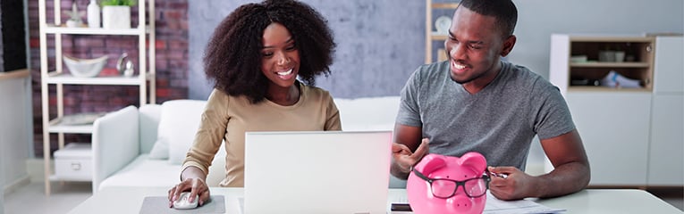 Happy African Couple Doing Retire Finances Plan And Money Budget-1