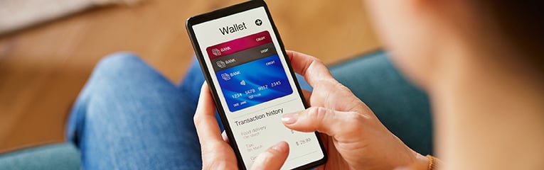 Latin hispanic woman checking digital wallet on smartphone