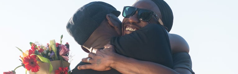 Peach-State-has-the-Valentines-Day-Gift-Ideas-to-Keep-Your-Budget-In-Line-Two-Men-Hugging