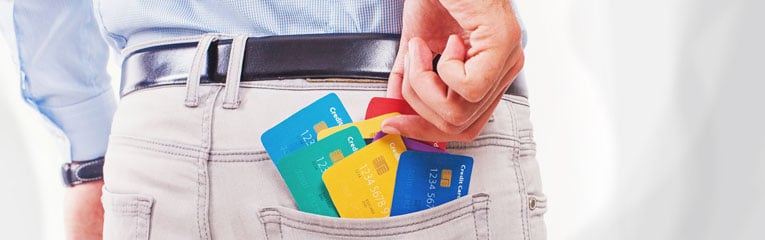 Picking-the-right-visa-credit-card-can-be-tricky-for-this-guy-with-multiple-cards-in-his-back-pocket