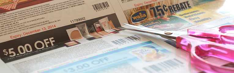 Woman prepare to cut coupon