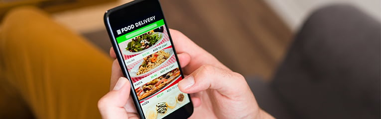 Young man ordering take out food