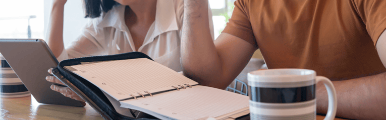 couple working on bills