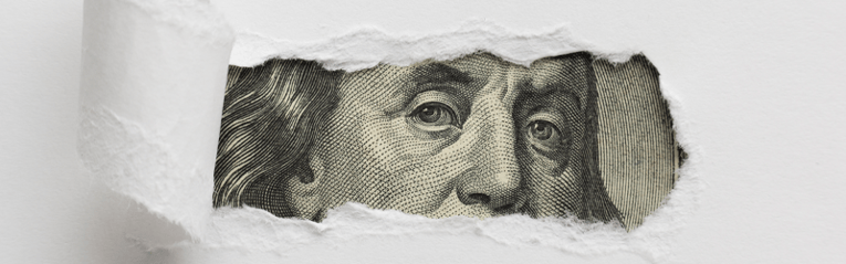 dollar bill peaking through