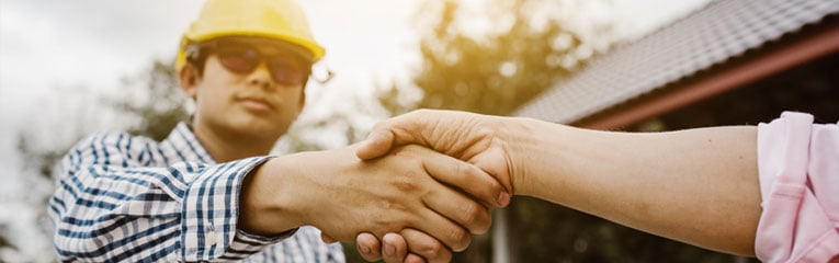 home-inspector-shaking-clients-hand