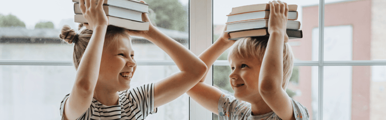 kids with library books on their heads