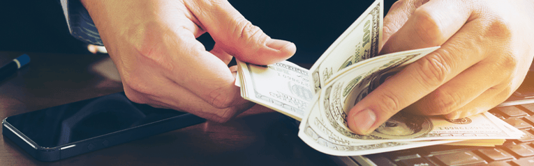 man counting cash