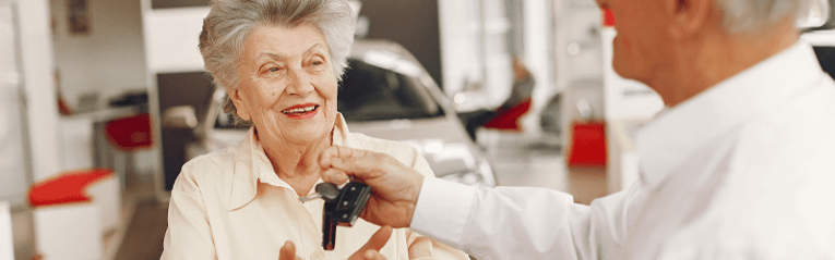 older woman getting car keys