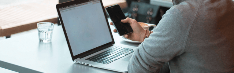 researching on laptop