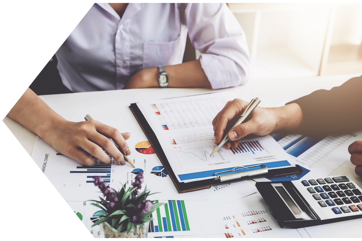 Business owners looking at earnings with a Business Money Market Account from Peach State FCU Business owners looking at earnings with a Business Money Market Account from Peach State FCU