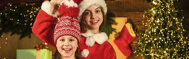 Children with presents at during the holidays