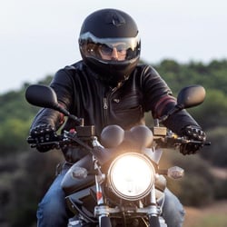 Man enjoying his motorcycle with a motorcycle loan from Peach State FCU