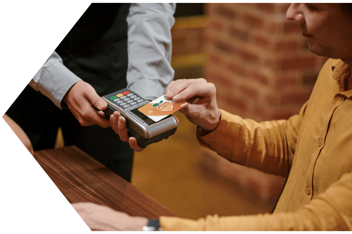 Man uses PSFCU visa debit card tap to pay feature