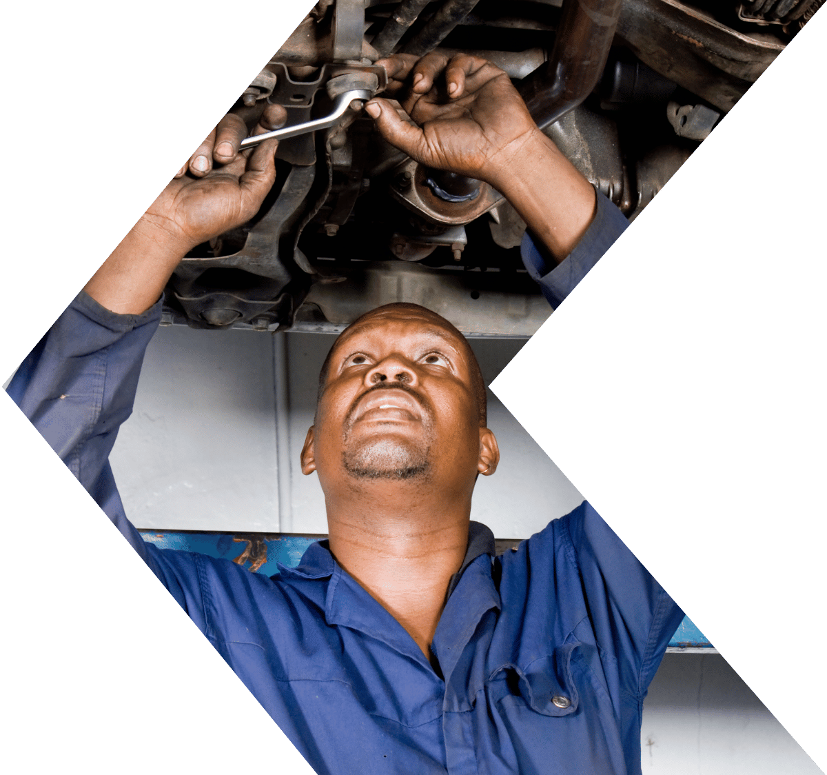 Mechanic fixing a car with an extended warranty Mechanic fixing a car with an extended warranty
