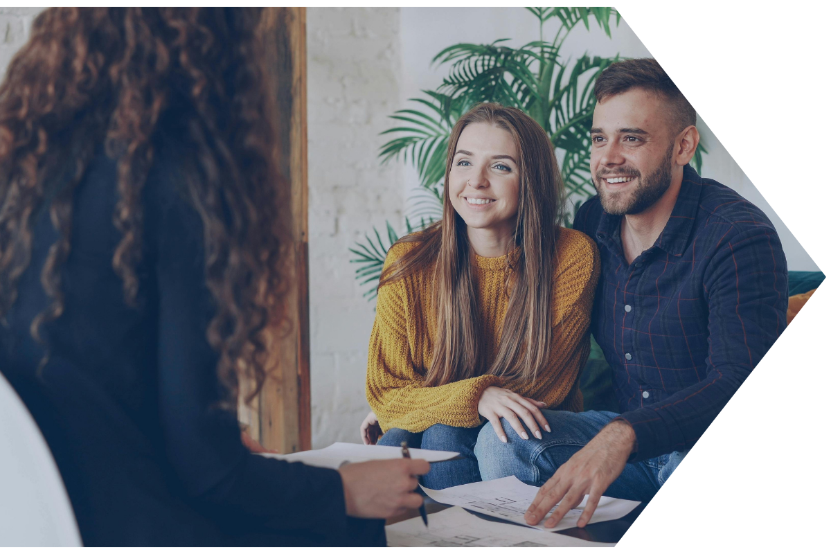 cuple sitting with life insurance representative