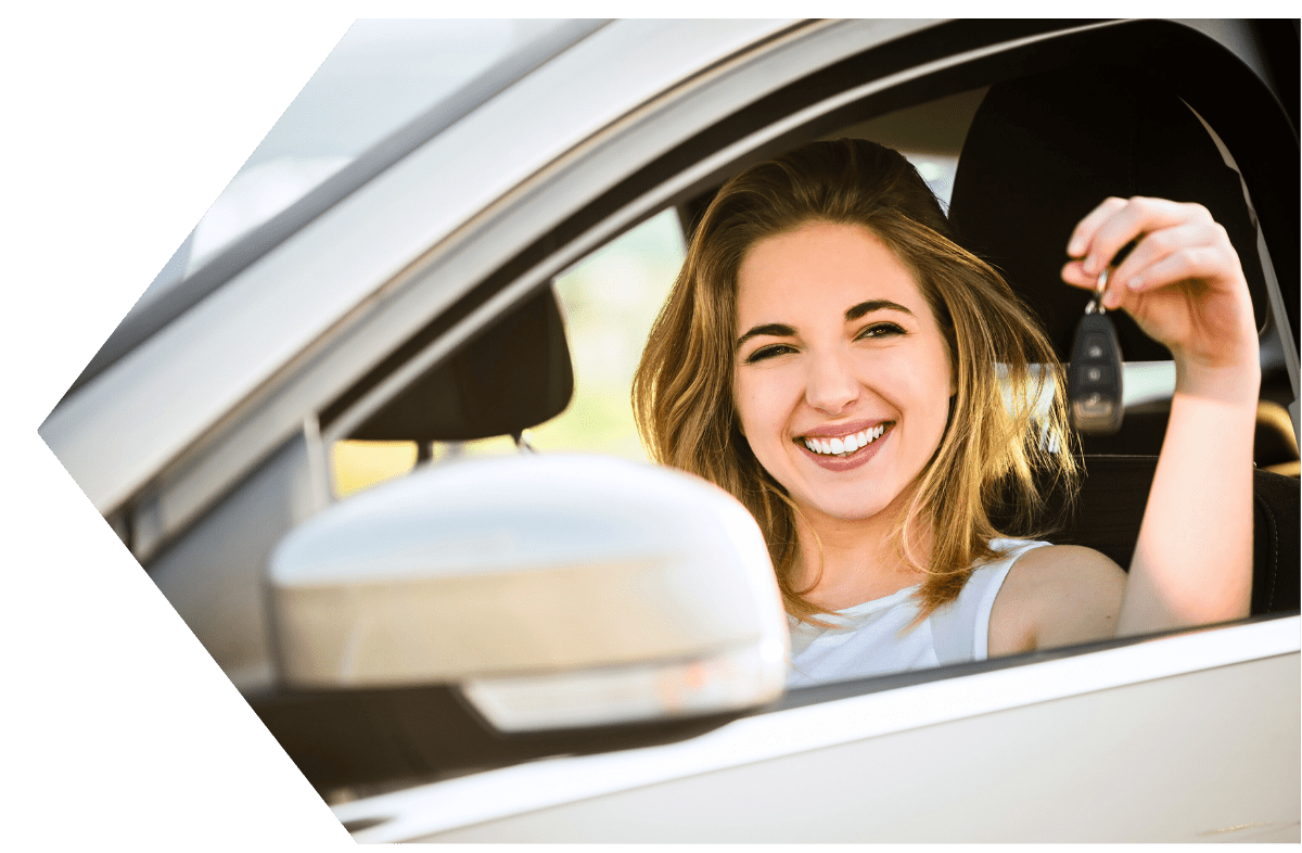 Teenager getting her first car with an auto loan from Peach State FCU Teenager getting her first car with an auto loan from Peach State FCU