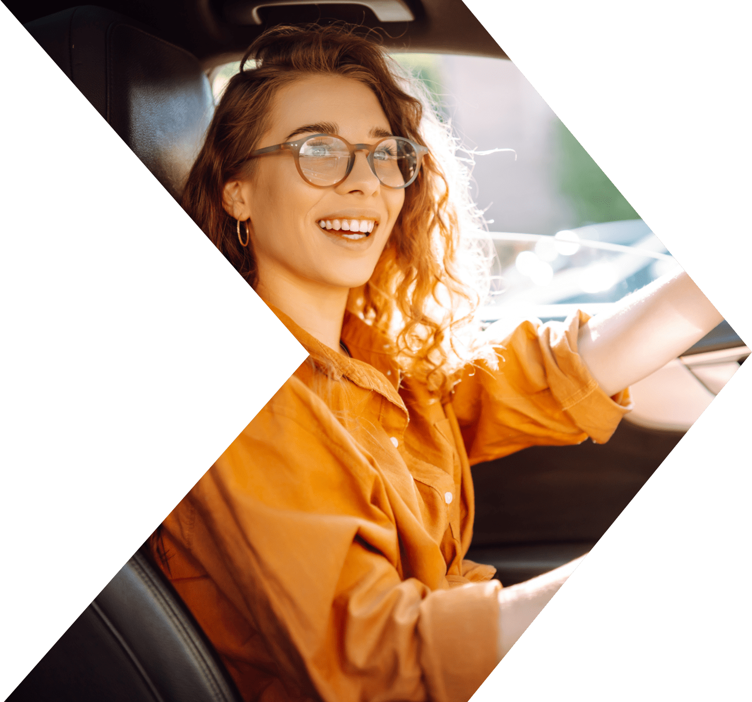 Young woman driving away with a fresh start second chance auto loan from Peach State FCU Young woman driving away with a fresh start second chance auto loan from Peach State FCU