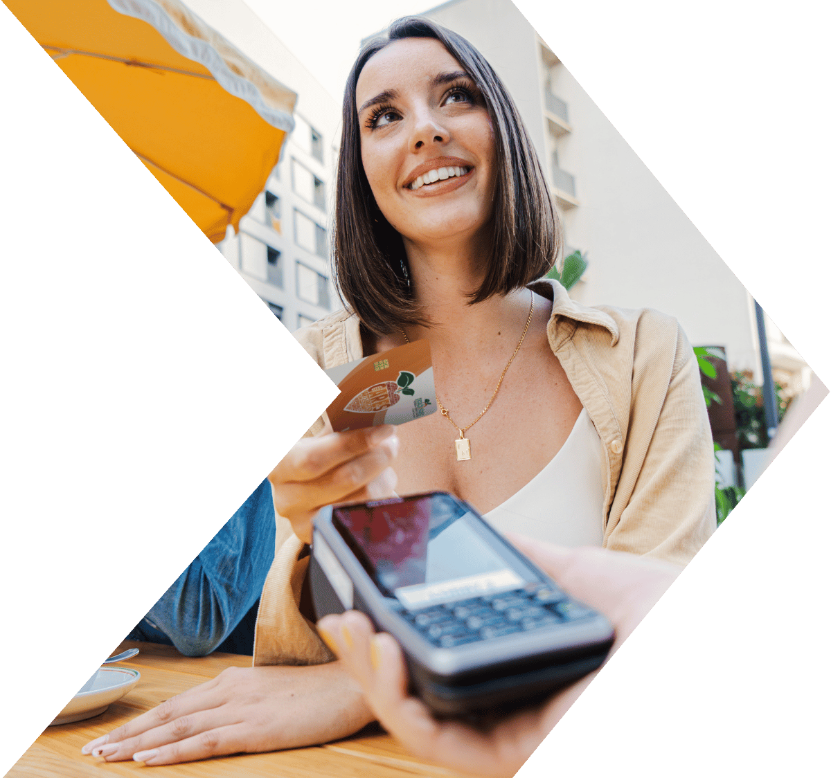 Young woman with overdraft protection on her Peach State FCU Debit Card