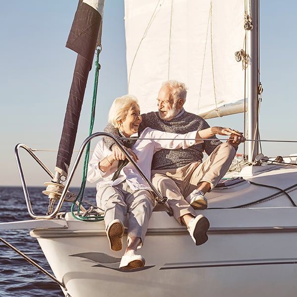 Older couple enjoying day on the boat