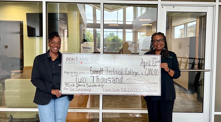 Rick Davis Scholarship check presentation at gwinnett tech