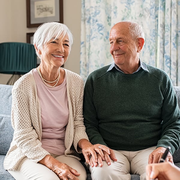 Elderly couple talk about savings with each other