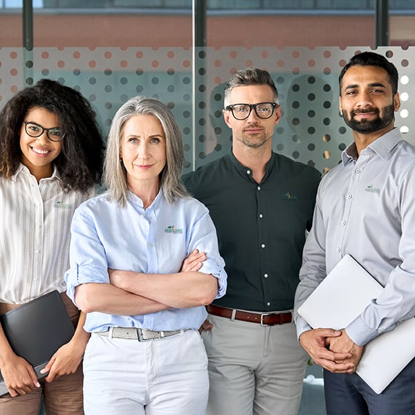 Co-workers pose for photo