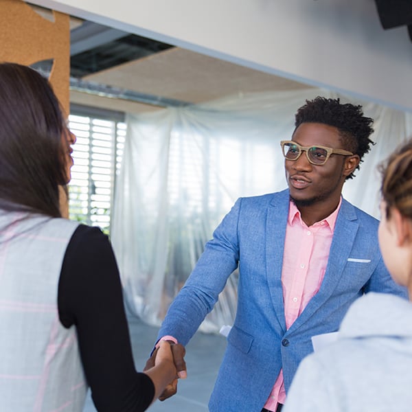 Business owner meets with Realtors