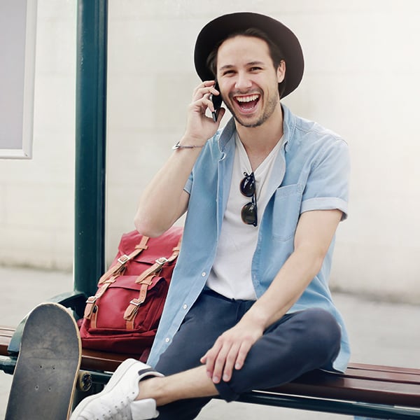 Gentleman smiles while talking to Peach State Loans by Phone