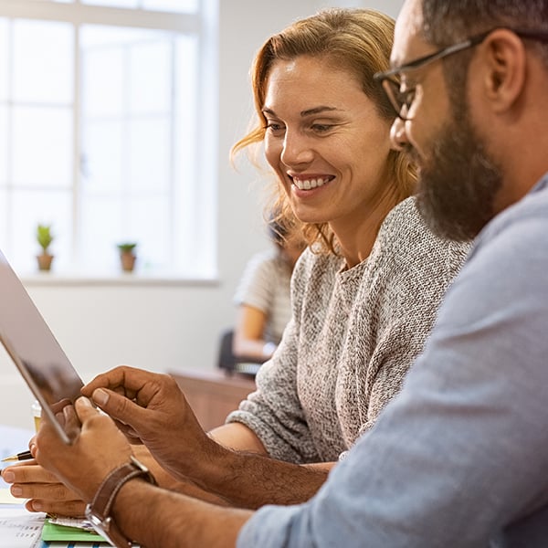 Co-workers enjoy their direct deposit features