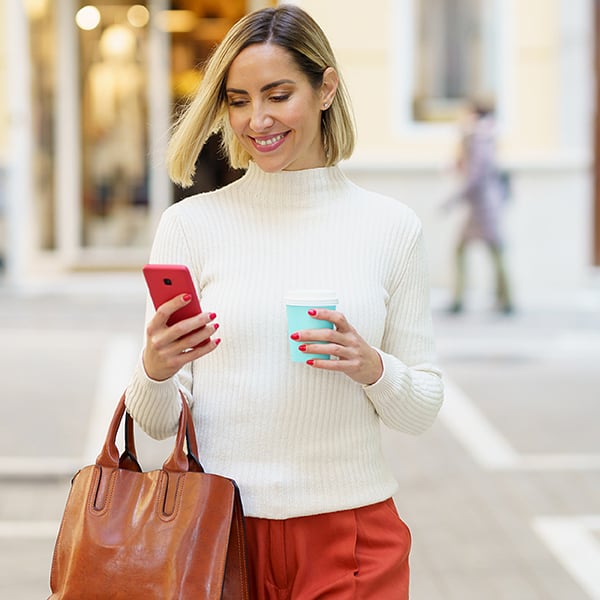 Lady uses payroll deduction while taking a stroll