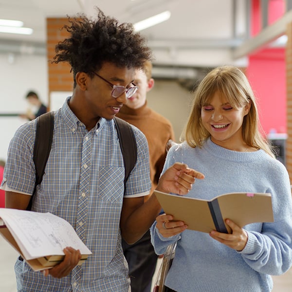 Teen friends walk through school