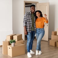 Young couple moves into new house
