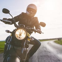 Motorcycle cruising down open road