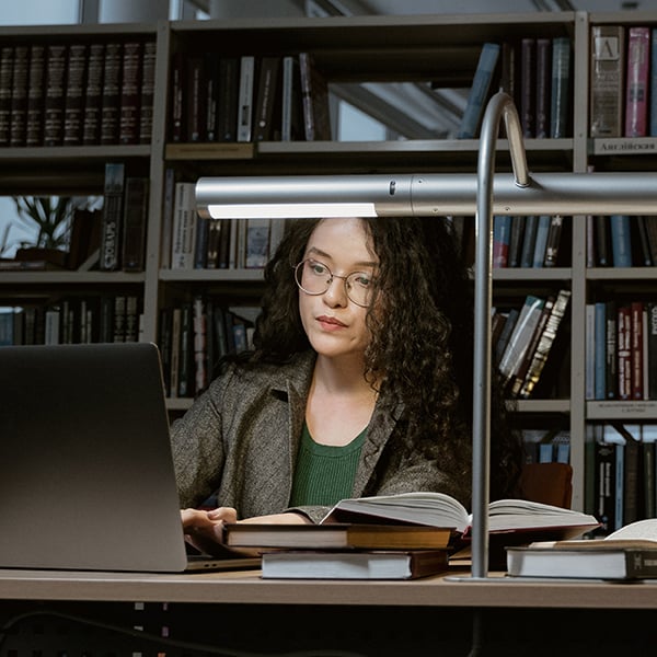 Woman studies for her night classes