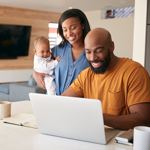 New family applies for Skip-A-Loan on laptop
