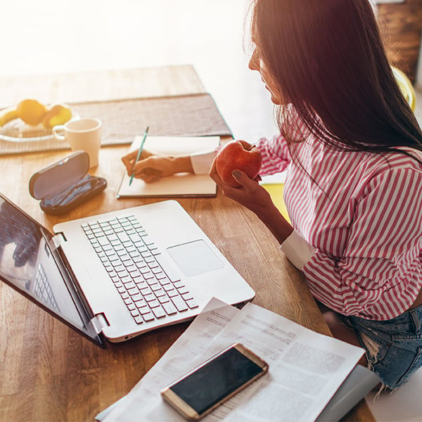 Woman writes down routing number