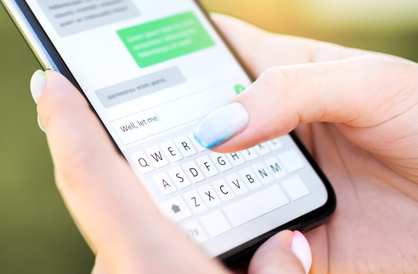 bigstock-Text-Message-With-Mobile-Phone-424566623
