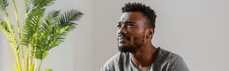 man thinking about options