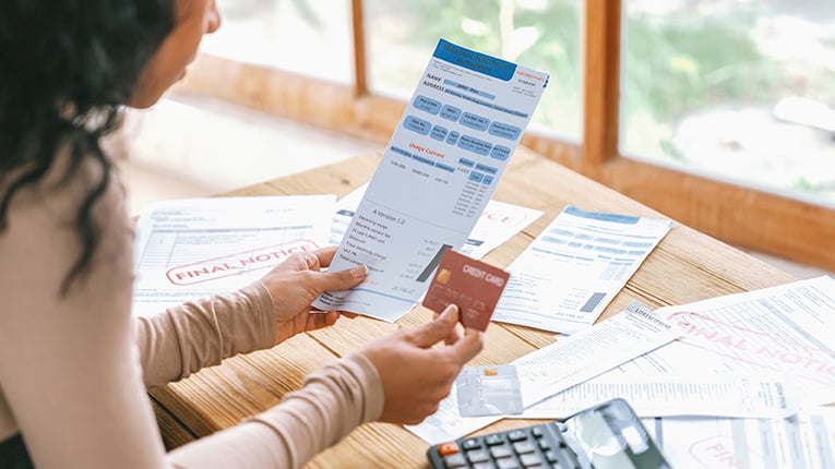 Stressed young woman has financial problems credit card debt to pay