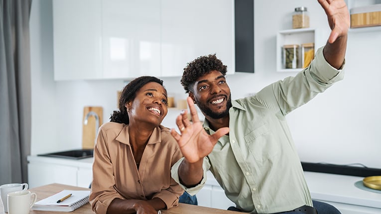 happy couple making home renovations 