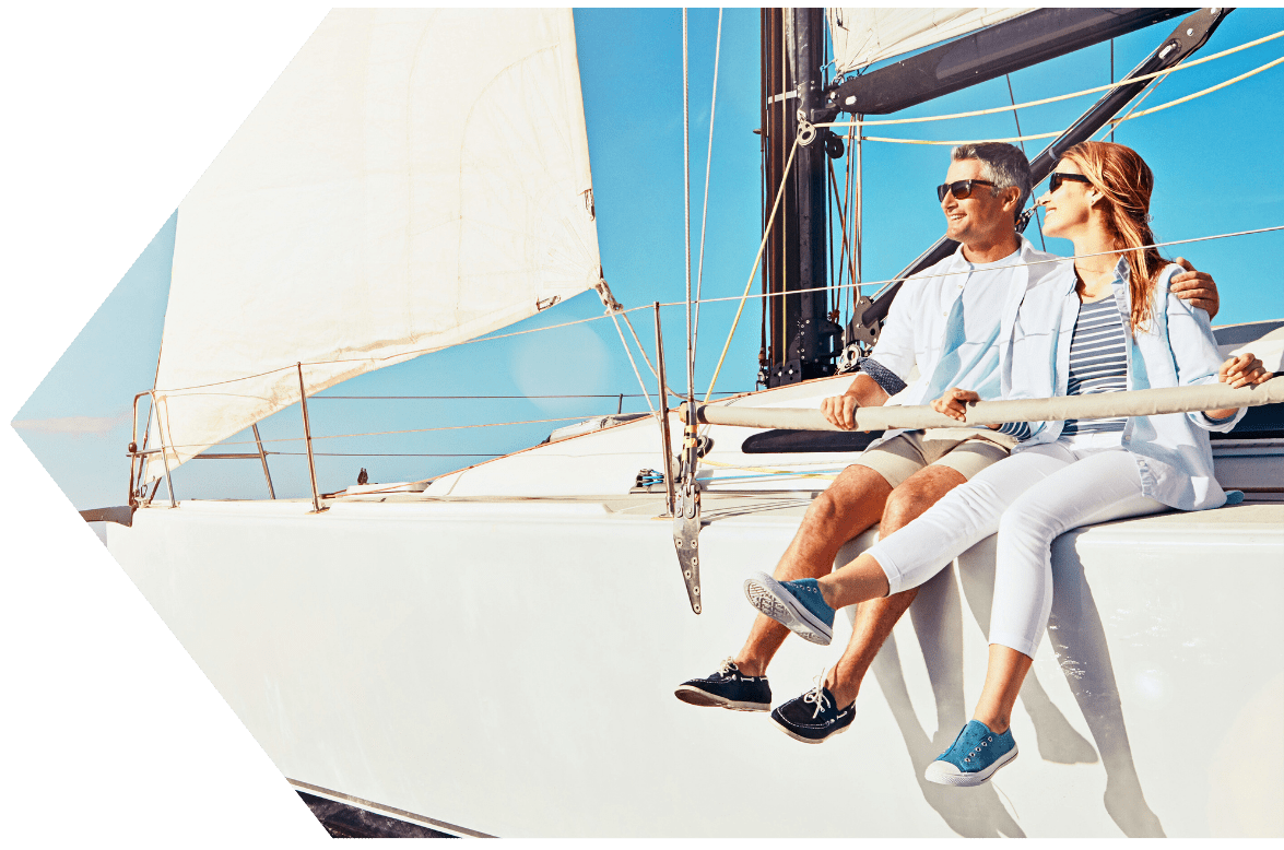 Couple on their boat purchased with a boat loan from Peach State FCU Couple on their boat purchased with a boat loan from Peach State FCU