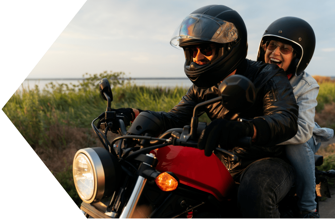 Couple riding their motorcyle with a loan from Peach State FCU Couple riding their motorcyle with a loan from Peach State FCU