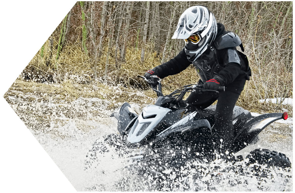 Kid on ATV in water with an ATV Loan from Peach State FCU Kid on ATV in water with an ATV Loan from Peach State FCU