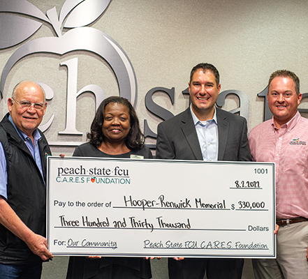 Hooper Renwick Check Presentation at Peach State FCU
