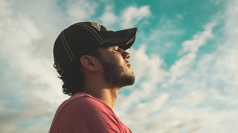 Relaxed middle-aged man taking in nature